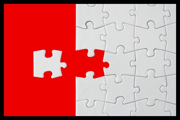 Puzzle with missing piece symbolizing engagement strategies through gamification at live events.