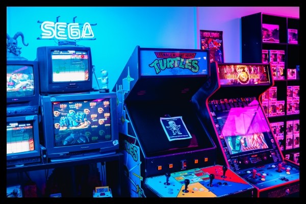 Arcade environment reflecting playful gamification tactics at live marketing exhibits.