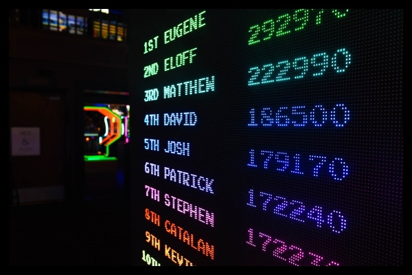 Digital leaderboard display showcasing attendee scores at a live exhibit gamification experience.